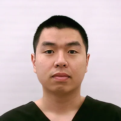 A headshot photo of Massage Therapist Duy Vu