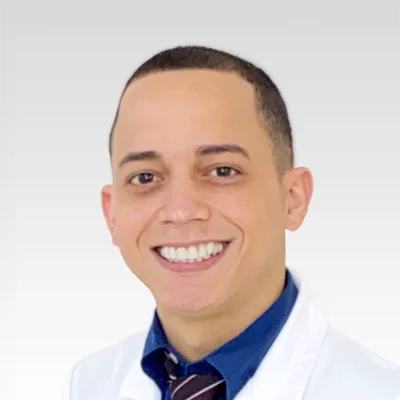 A headshot photo of nurse practitioner Jonathan Torres Pabon